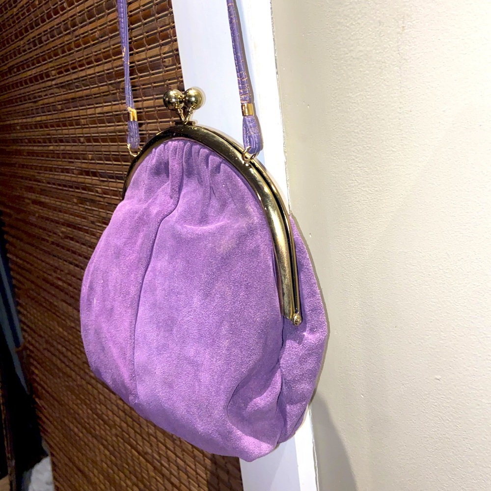 Purple crossbody clamshell clasp bag